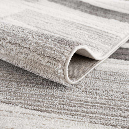Rug Bojana broken-striped area rug with plush boucle pile in beige-gray Boutique Rugs on Tampa Home & Garden Store