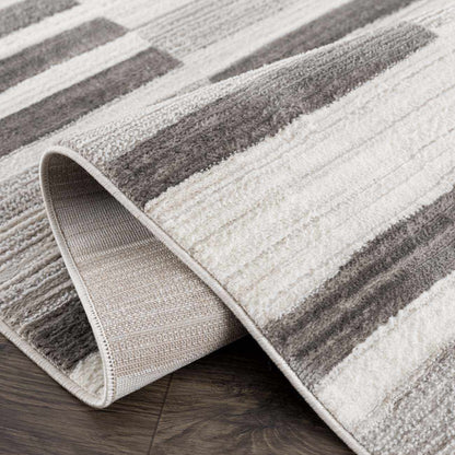 Bojana broken-striped area rug in cream and gray tones by Boutique Rugs on Tampa Home & Garden Store