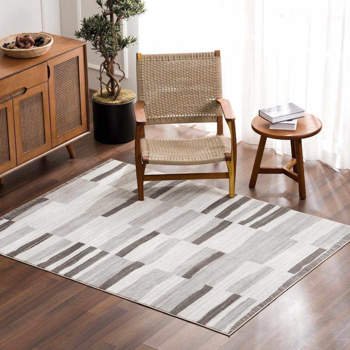 Bojana broken-striped area rug, neutral gray tones, Boutique Rugs clearance on Tampa Home & Garden Store