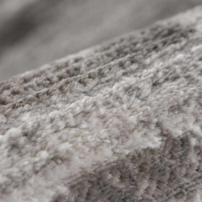 Bojana broken-striped area rug close-up in neutral gray beige by Boutique Rugs on Tampa Home & Garden Store