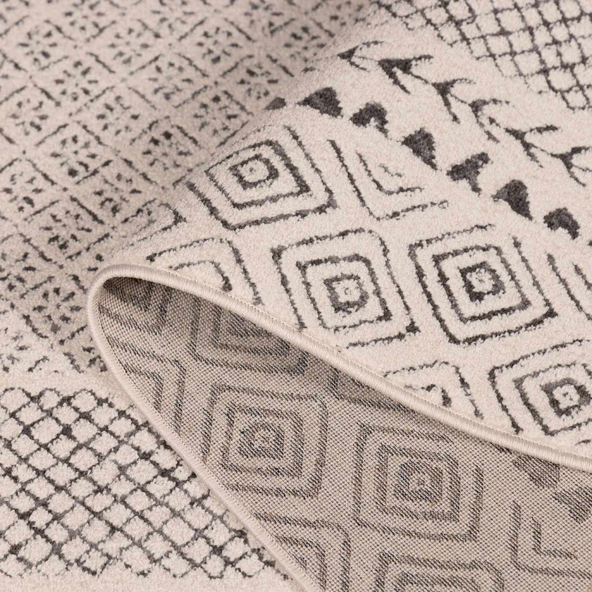 Burdette Soft Neutral Rug by Boutique Rugs, cream and gray geometric pattern on Tampa Home & Garden Store
