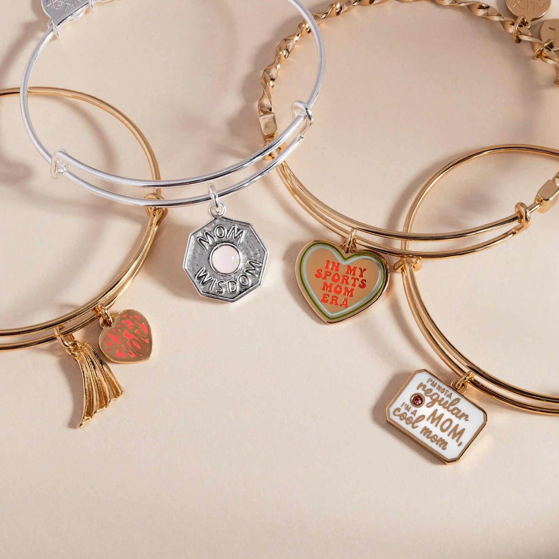 Super Mom heart and cape charm bangle by Alex and Ani; gold and silver-tone enamel heart charm on Tampa Home & Garden Store