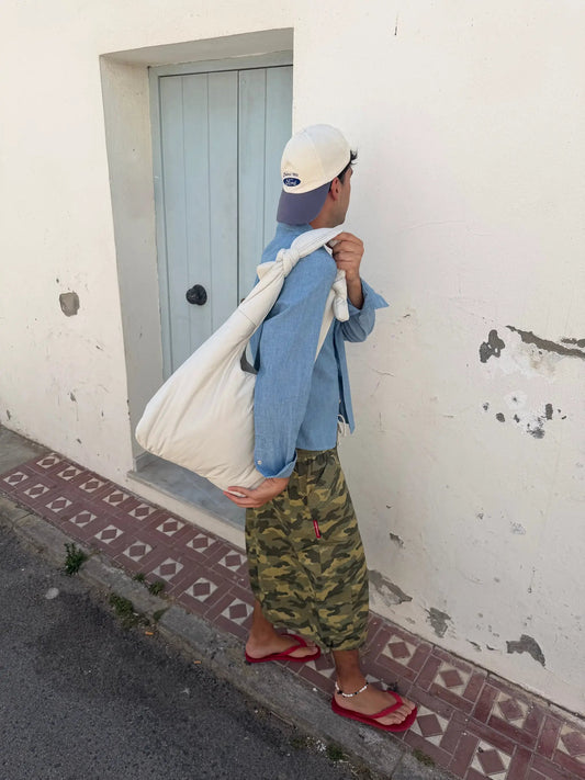 Biwa Puffy Bag Fossil by Lefrik USA cream tote carried over shoulder by denim shirt wearer on Tampa Home & Garden Store