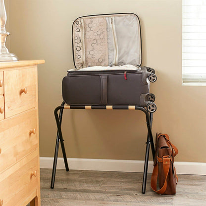Portaequipajes plegable de metal negro con correas de tela caqui