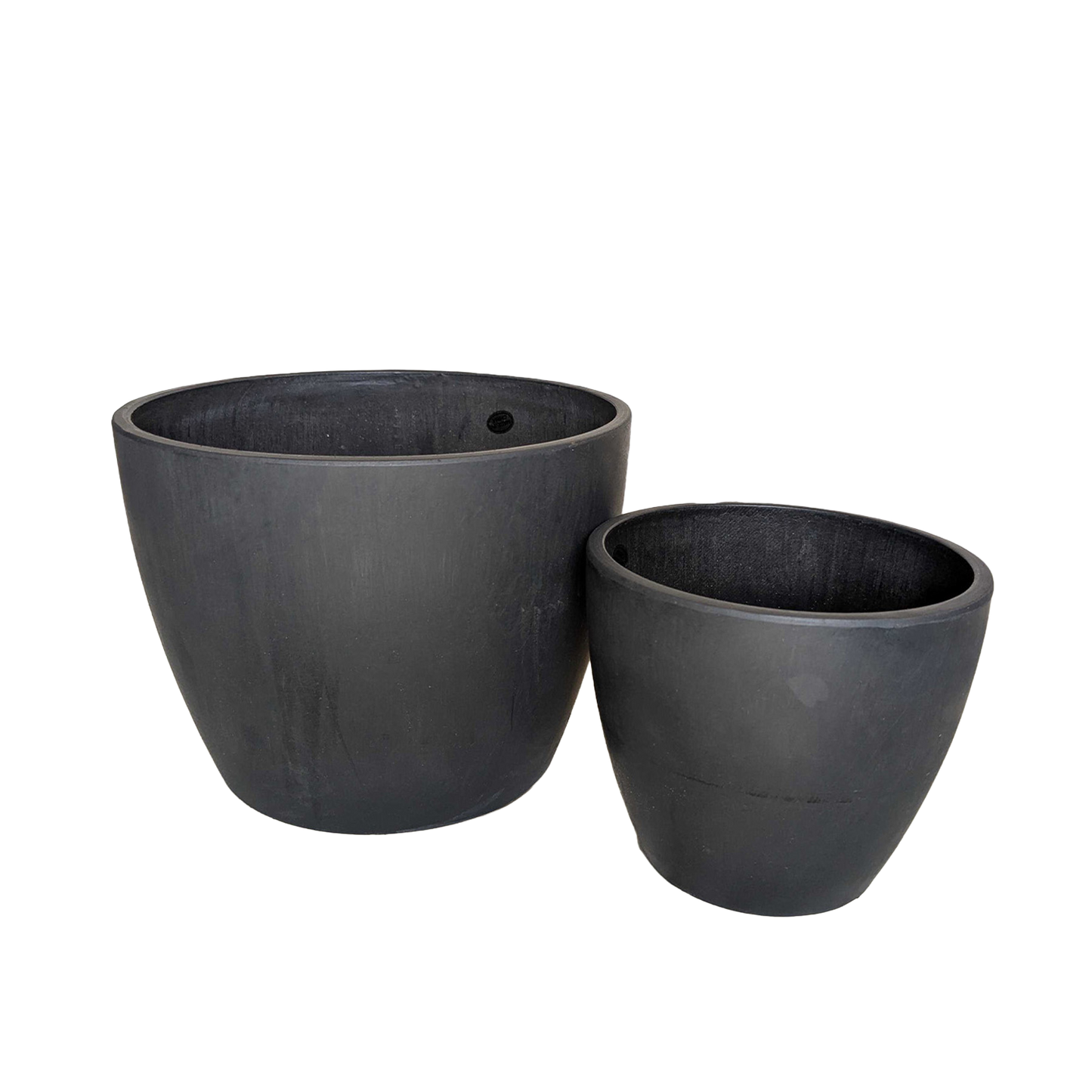 Black eco plant pots from Rooted Treasures Farms in two sizes on Tampa Home & Garden Store