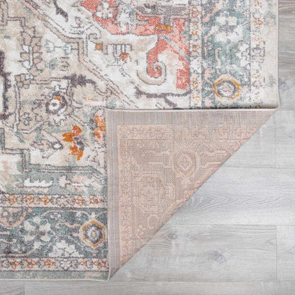 Bolinas area rug by Boutique Rugs, ornate medallion pattern in ivory, teal, coral on Tampa Home & Garden Store