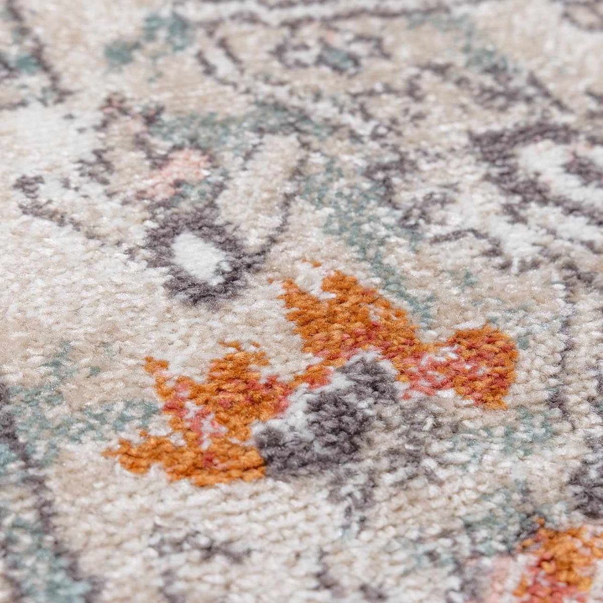Bolinas Area Rug beige base with orange accents and sage details in plush pile by Boutique Rugs on Tampa Home & Garden Store