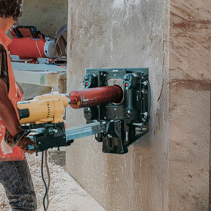 GRABO Bore Mount Core Drill Holder, Two-Cup teal suction mount attached to concrete wall on Tampa Home & Garden Store