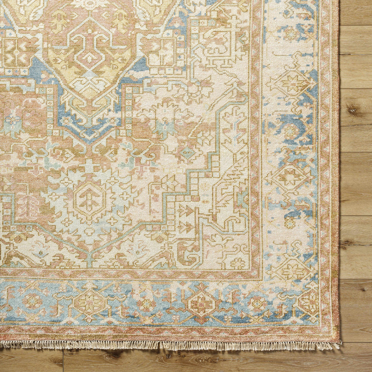 Bangonay Area Rug pink beige blue with an intricate oriental motif and fringed border on Tampa Home & Garden Store
