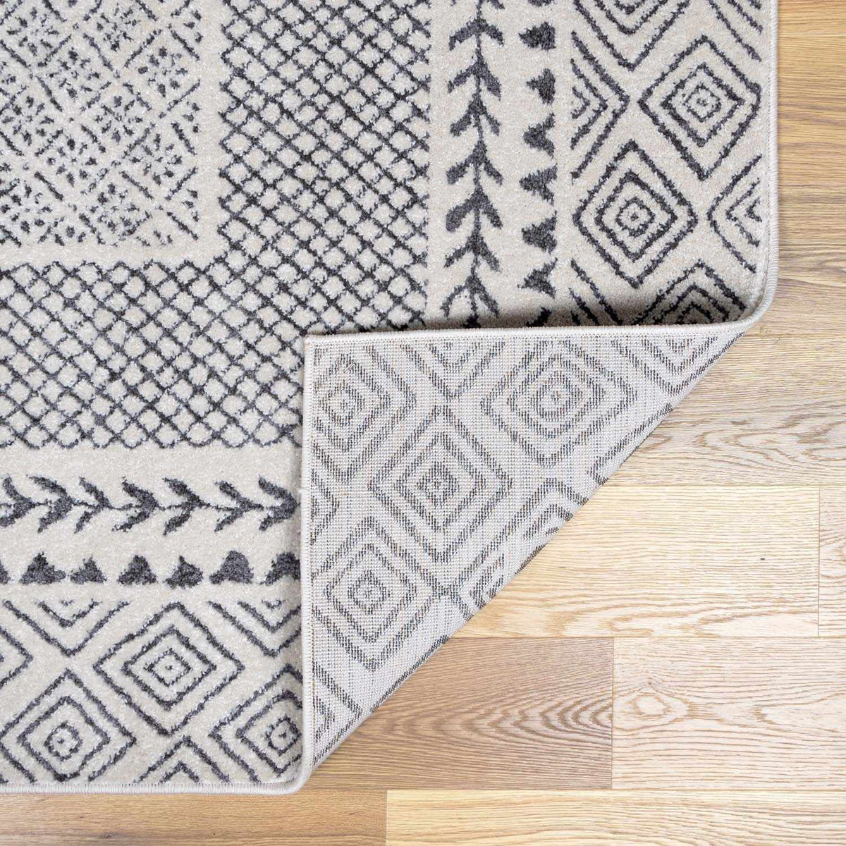 Burdette Soft Neutral Rug by Boutique Rugs, gray and cream geometric pattern on Tampa Home & Garden Store