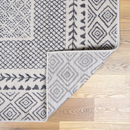 Burdette Soft Neutral Rug by Boutique Rugs, gray and cream geometric pattern on Tampa Home & Garden Store