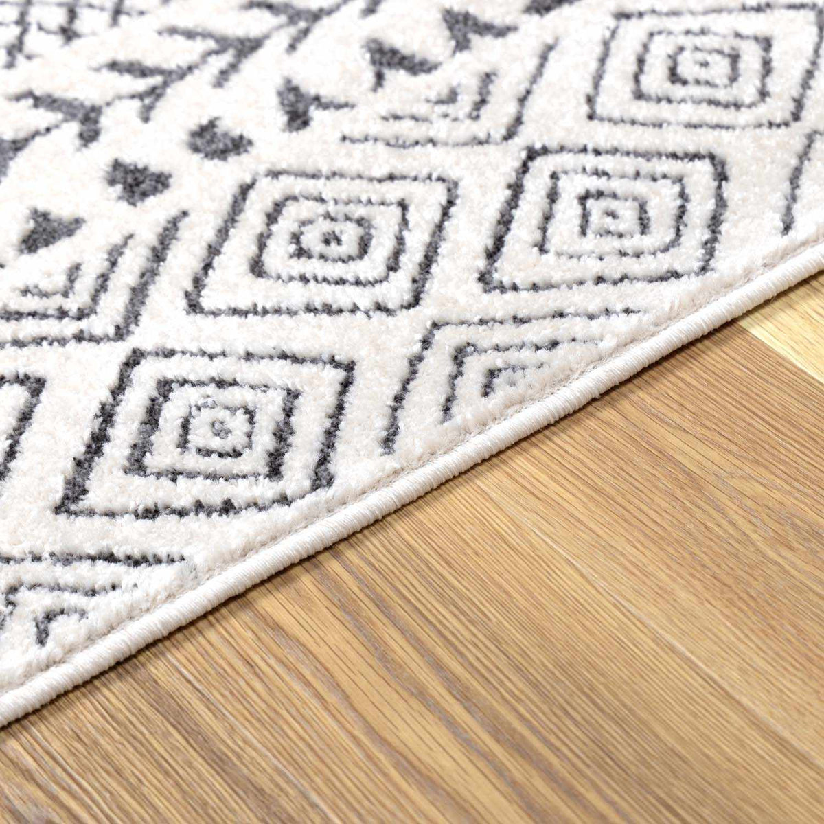 Burdette Soft Neutral Rug, cream with gray geometric squares by Boutique Rugs on Tampa Home & Garden Store