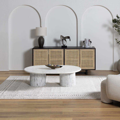 Burdette Soft Neutral Rug by Boutique Rugs in light beige under a coffee table on Tampa Home & Garden Store