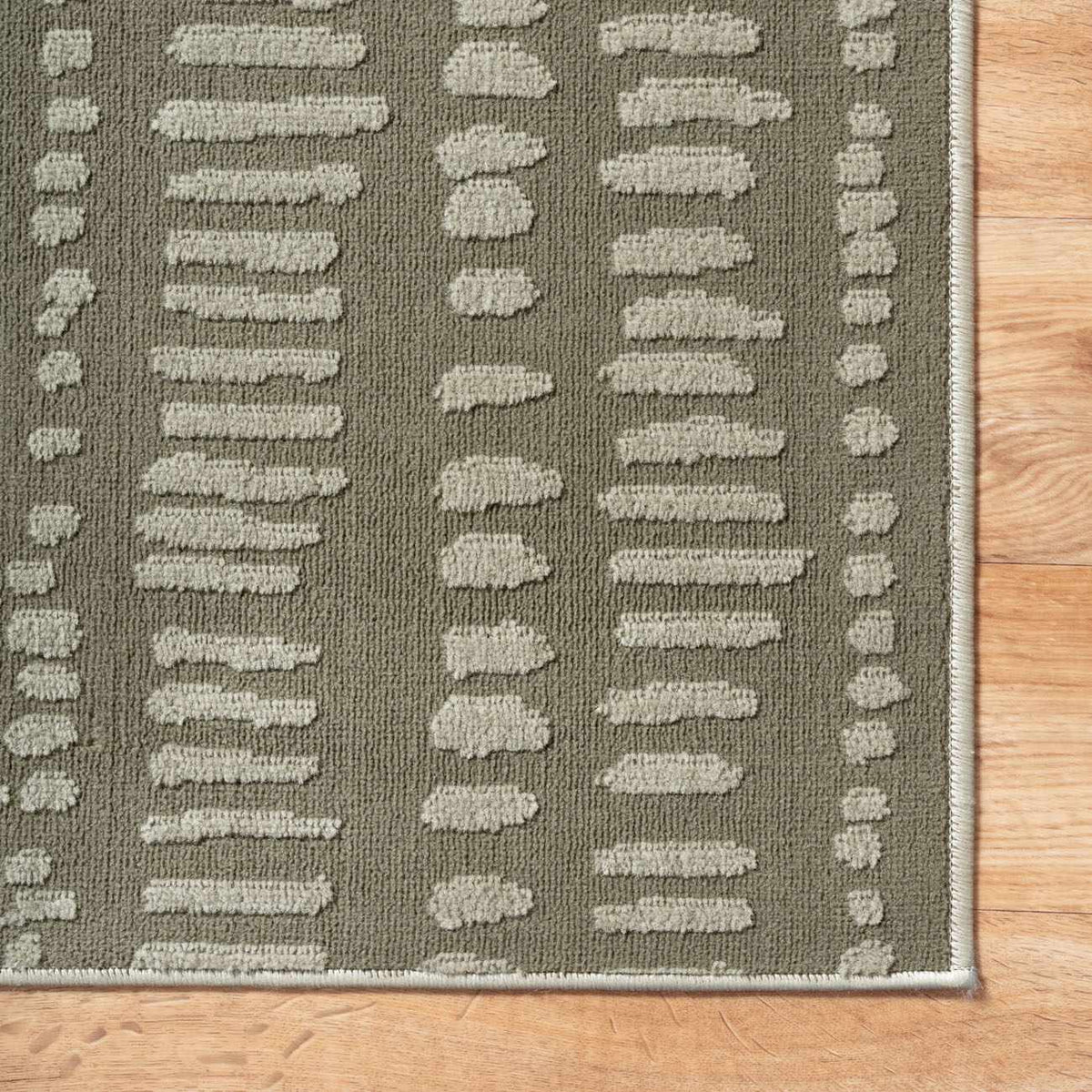 Dragos Green Modern Washable Area Rug, olive green base with beige dash motifs, Boutique Rugs on Tampa Home & Garden Store
