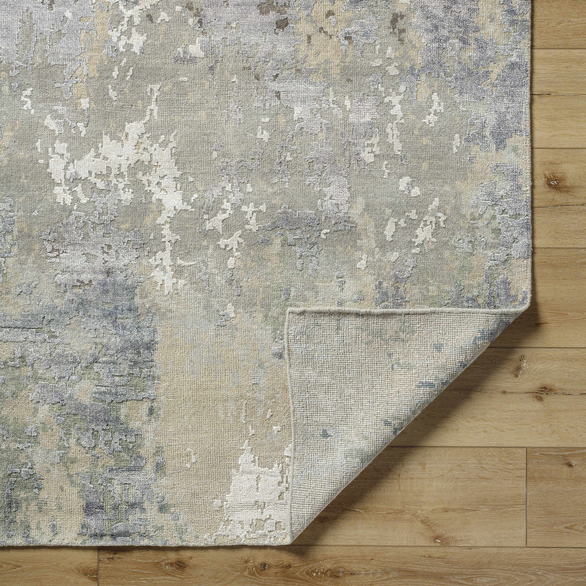 Bued Handmade Wool-Blend Rug by Boutique Rugs, neutral gray beige abstract pattern on wood floor on Tampa Home & Garden Store