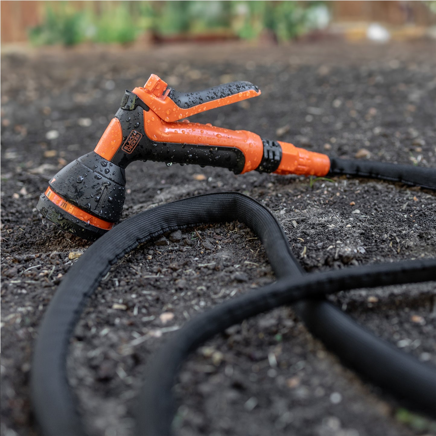 B+D 8-Pattern Nozzle BXWNBB57390 hose end spray nozzle orange/black with Black+Decker logo on Tampa Home & Garden Store
