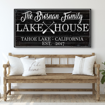 Family Lake House Paddle Sign II canvas, black plank background, white script, crossed oars on Tampa Home & Garden Store