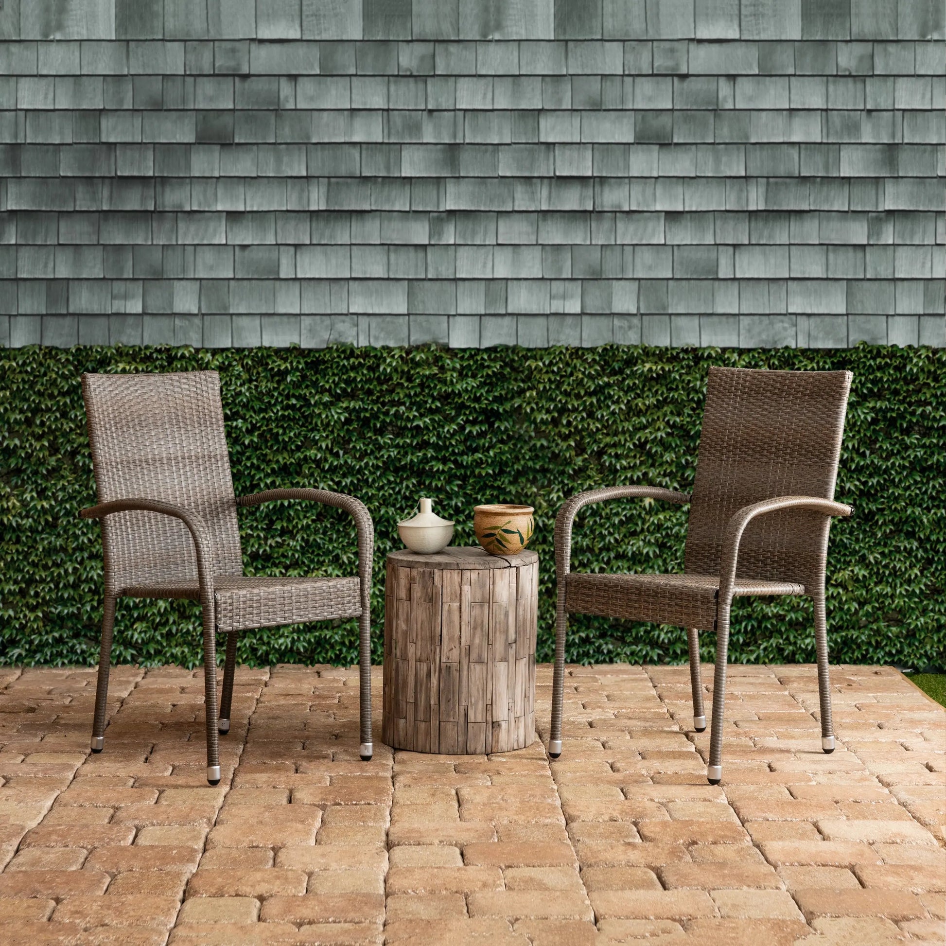 Morgan Outdoor Wicker Chair 2pk gray/brown wicker chairs around a wooden stump table on Tampa Home & Garden Store