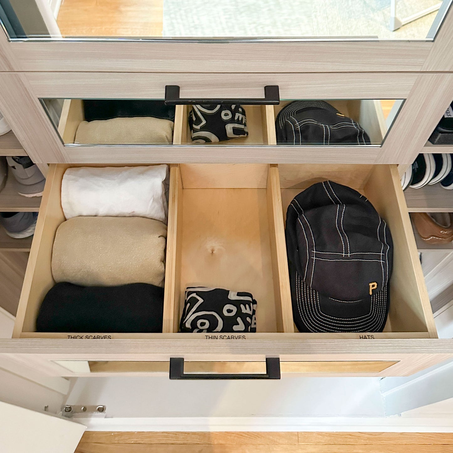 Natural bamboo expandable drawer dividers in a light wood dresser for hats and scarves on Tampa Home & Garden Store