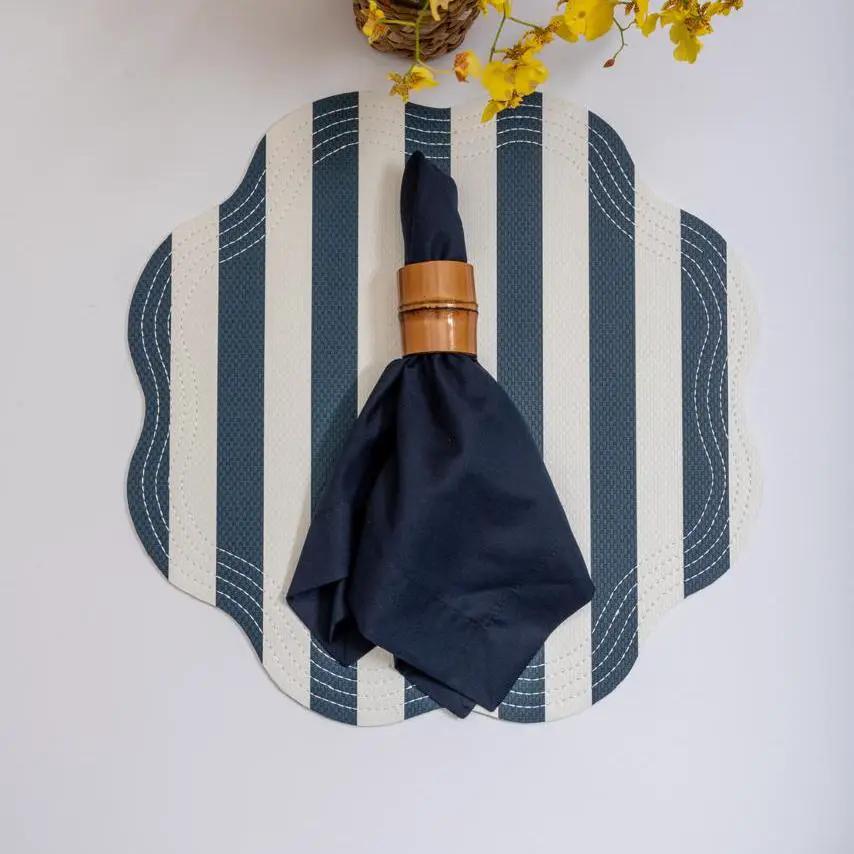 Brazilian Bamboo Napkin Ring with navy napkin on blue and white striped placemat on Tampa Home & Garden Store