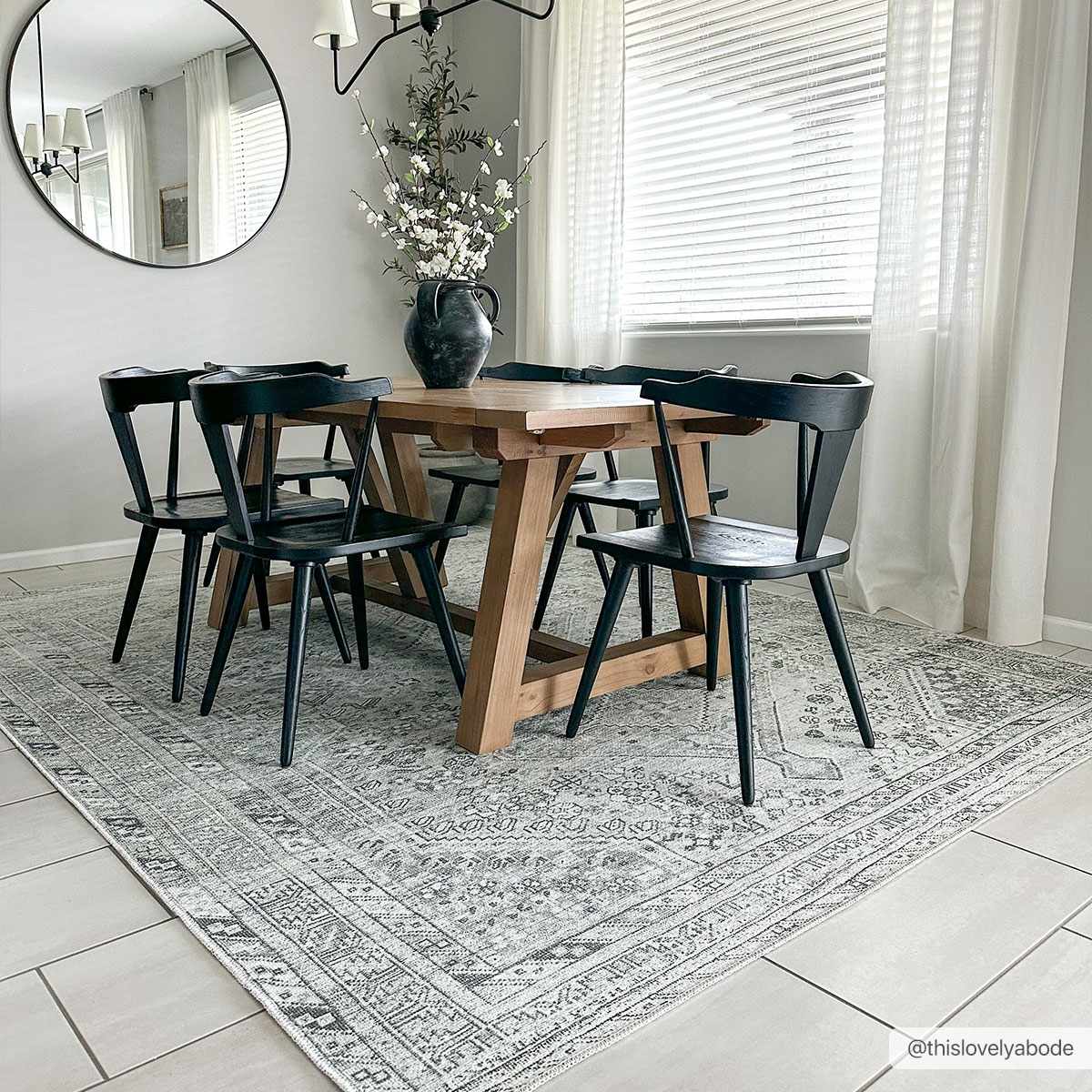 Barny Sage flat-pile washable rug by Boutique Rugs in light gray under dining table on Tampa Home & Garden Store