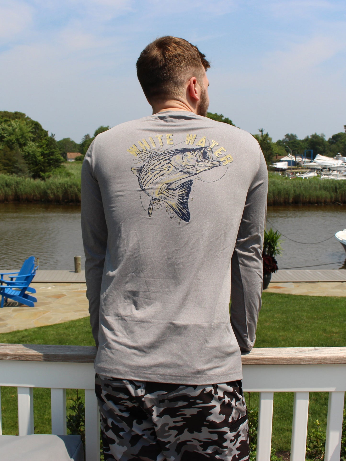Bass Graphic Performance Tee, gray long-sleeve with back fish illustration on Tampa Home & Garden Store