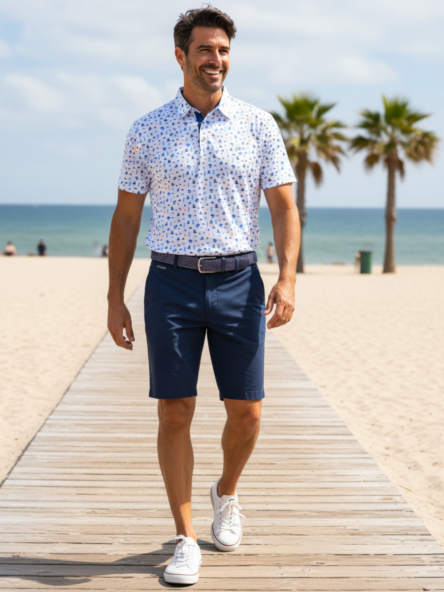 Beachside Performance Polo by White Water Life, short-sleeve polo with blue speckle print on Tampa Home & Garden Store
