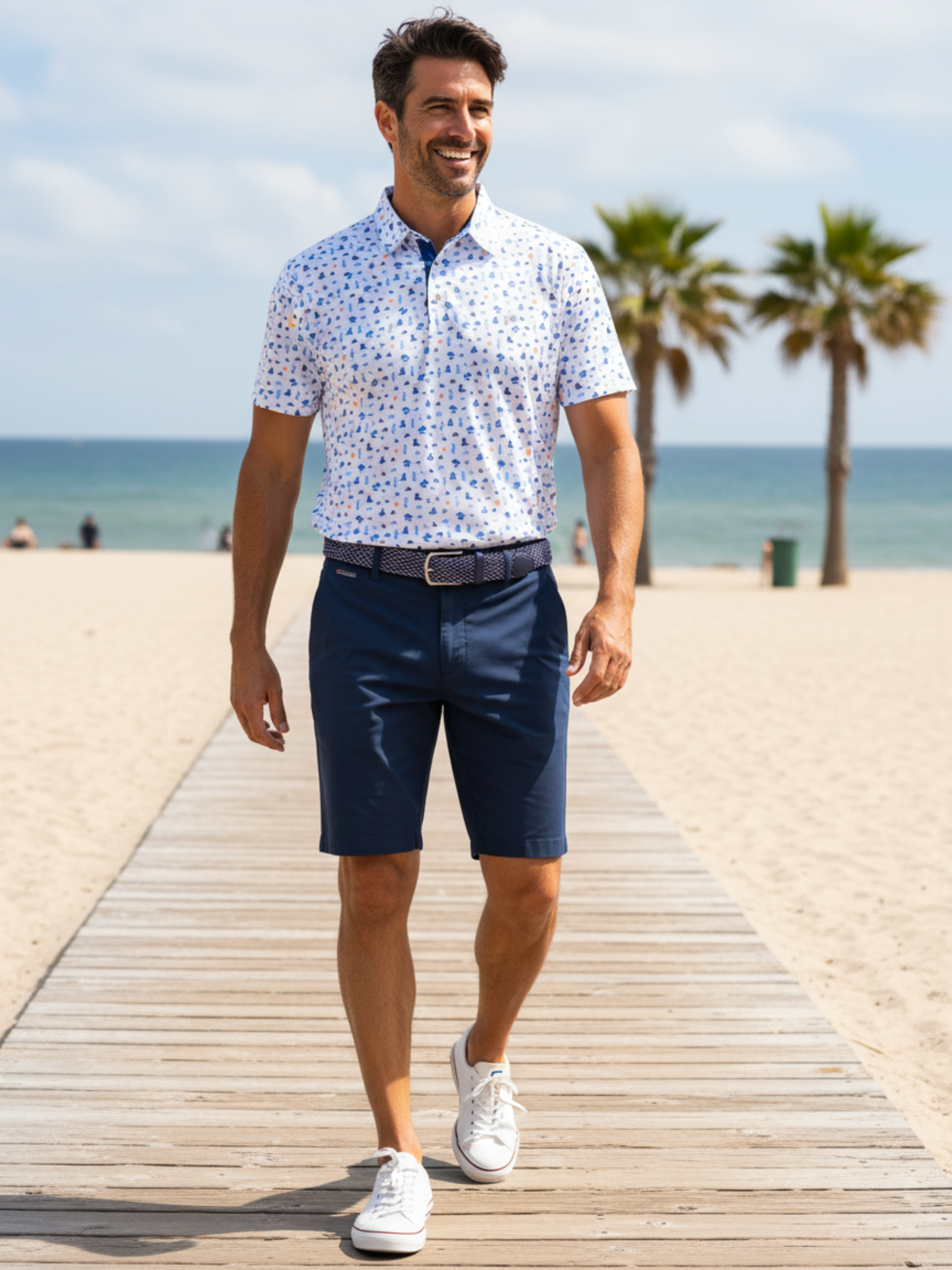 Beachside Performance Polo by White Water Life, short-sleeve polo with blue speckle print on Tampa Home & Garden Store