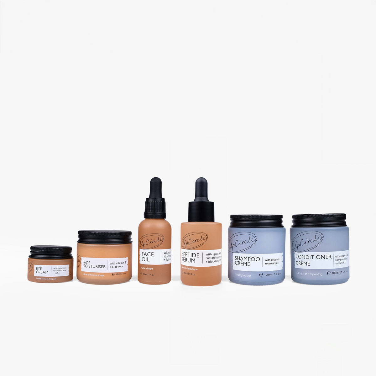 Best-Sellers Bundle skincare set by UpCircle with six bottles: eye cream, face moisturiser, face oil, peptide serum, shampoo crème, conditioner crème on Tampa Home & Garden Store