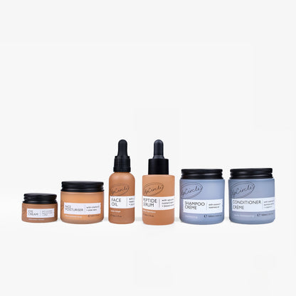 Best-Sellers Bundle skincare set by UpCircle with six bottles: eye cream, face moisturiser, face oil, peptide serum, shampoo crème, conditioner crème on Tampa Home & Garden Store