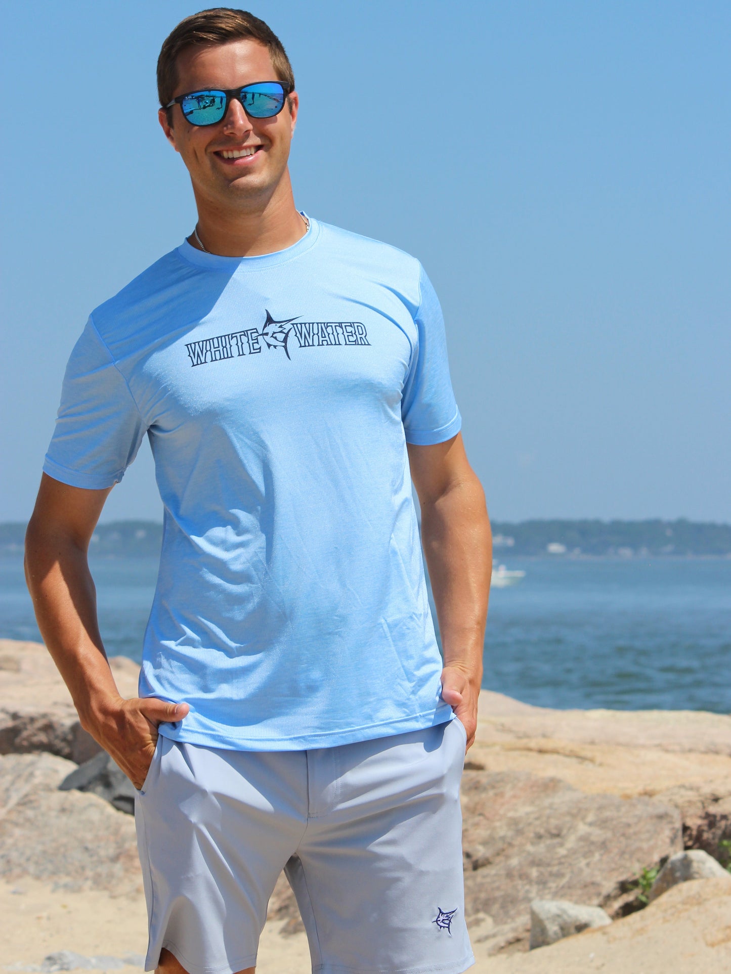 Bimini Primary Performance Tee, light blue short-sleeve, White Water Life logo on chest on Tampa Home & Garden Store