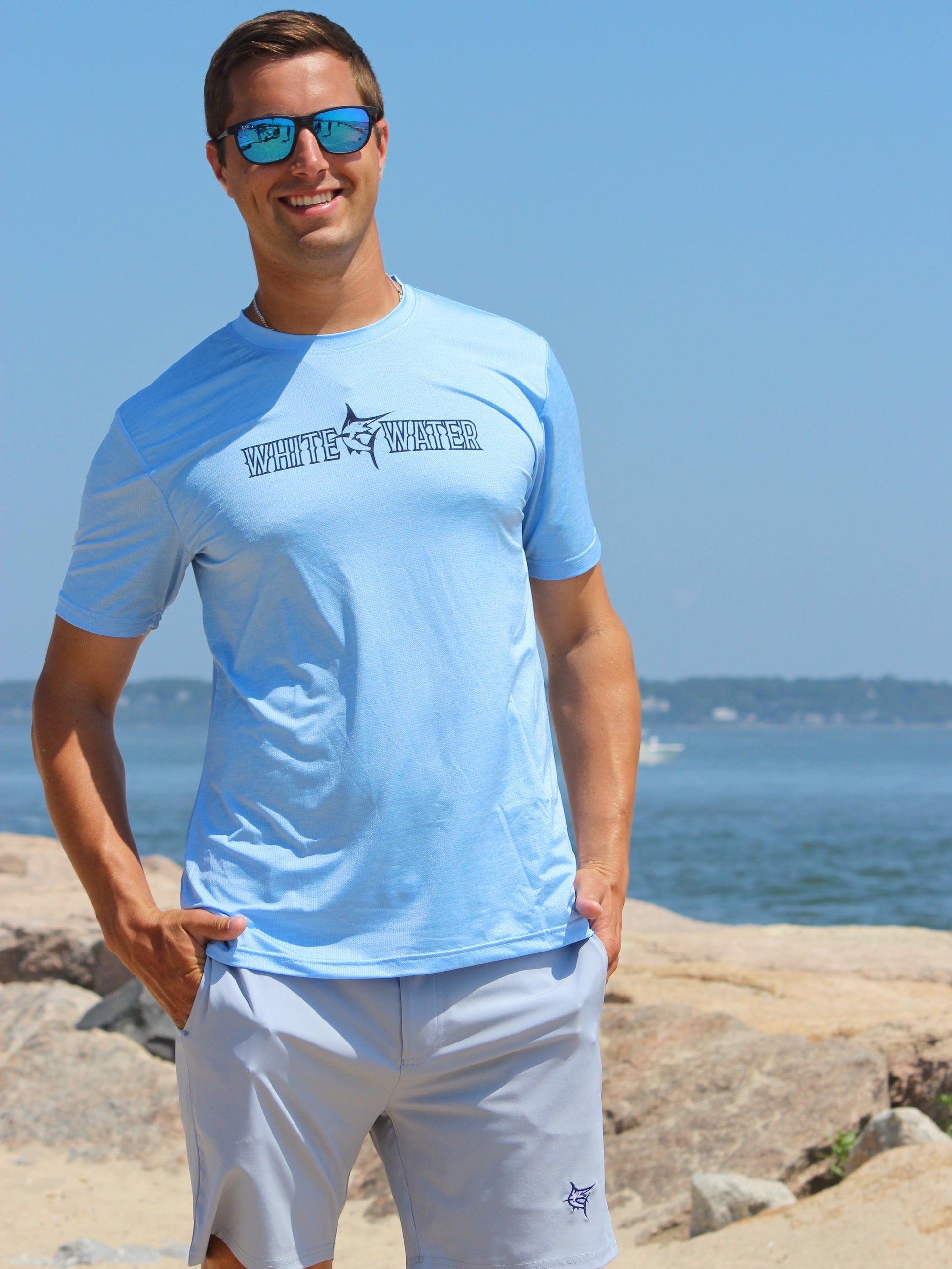 Bimini Primary Performance Tee, light blue short-sleeve, White Water Life logo on chest on Tampa Home & Garden Store