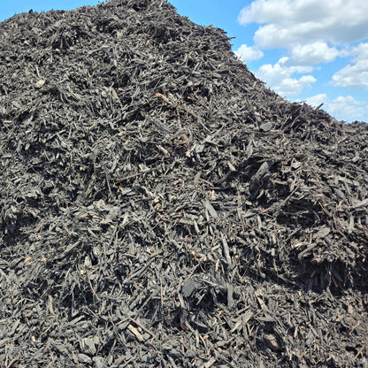 Black Mulch near Tampa | Black Mulch Delivery shown in a big pile - Tampa soil911.com