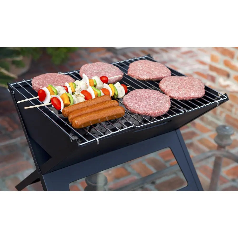Black Notebook Charcoal Grill outdoor BBQ with patties and skewers on Tampa Home & Garden Store