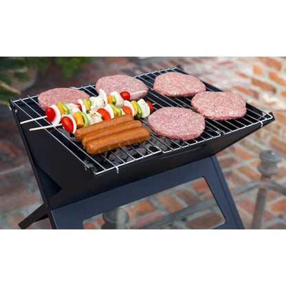 Black Notebook Charcoal Grill outdoor BBQ with patties and skewers on Tampa Home & Garden Store