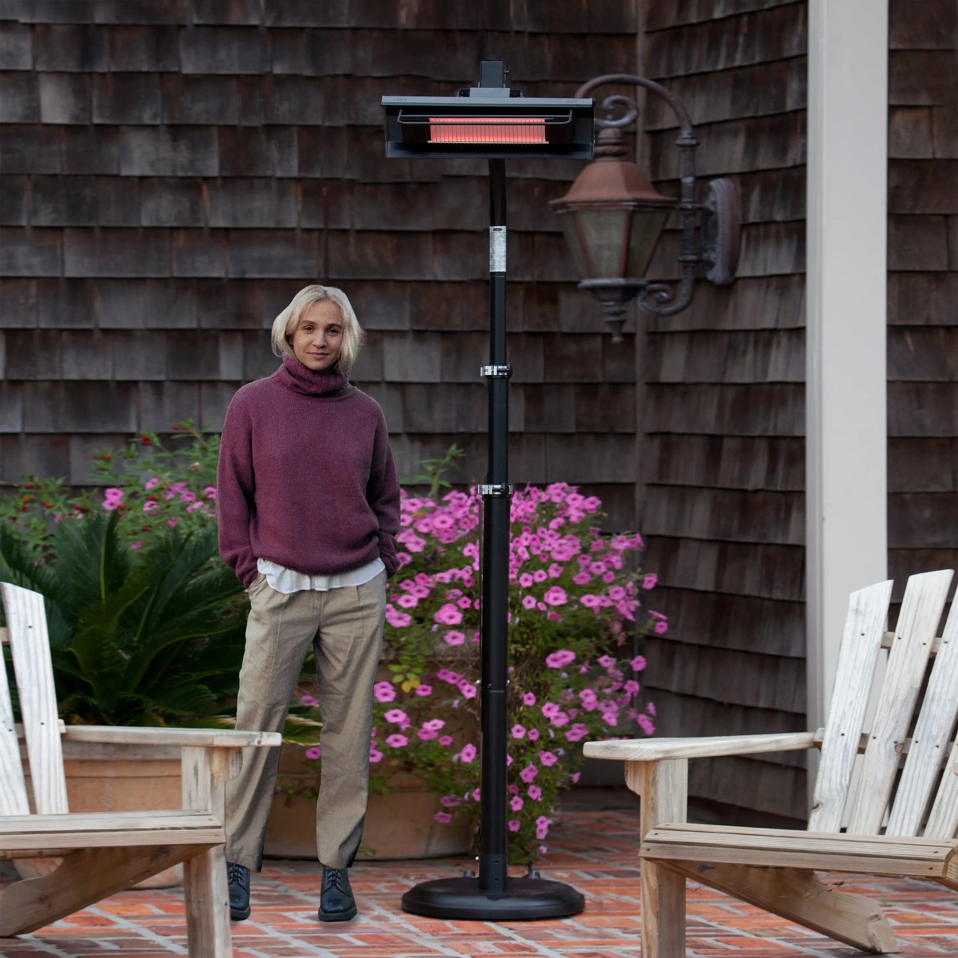 Black powder coated steel telescoping offset pole-mounted infrared patio heater on Tampa Home & Garden Store