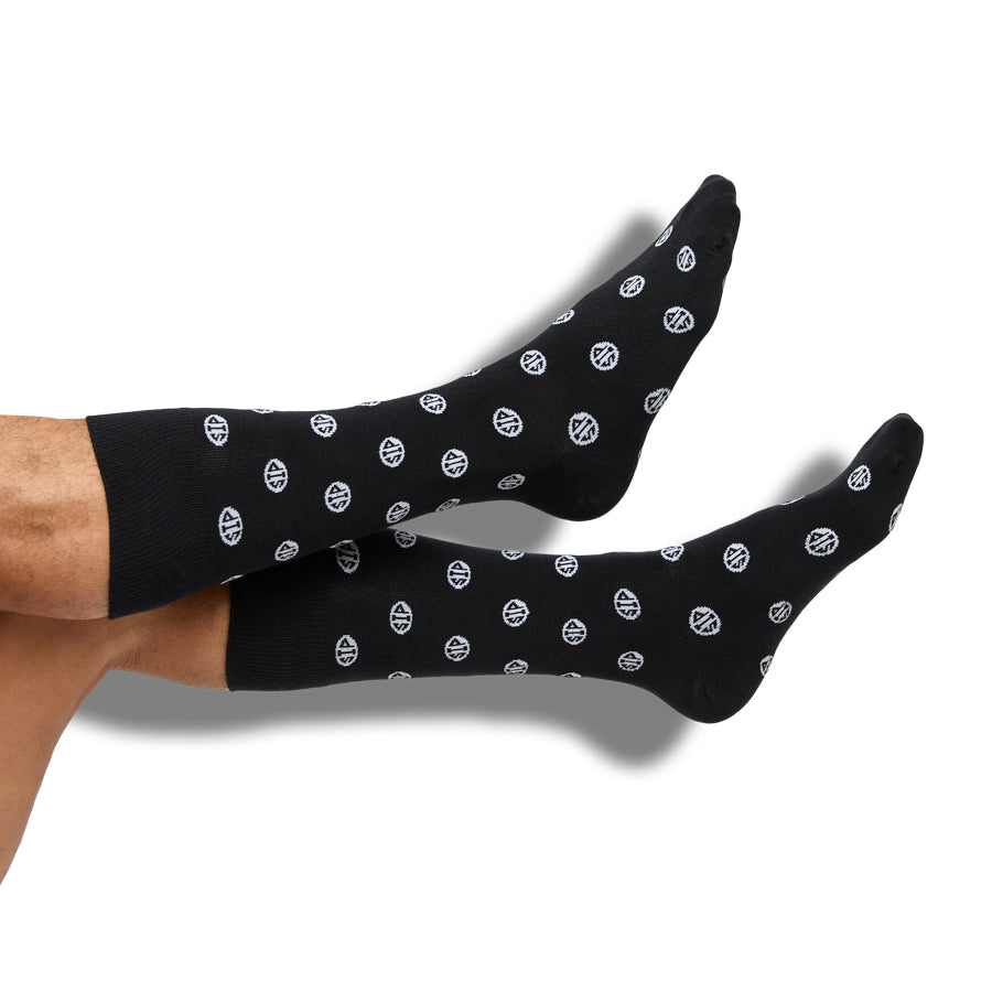 Ole Miss Lafayette 4-Pack DeadSoxy licensed college socks black with circular logos on feet on Tampa Home & Garden Store