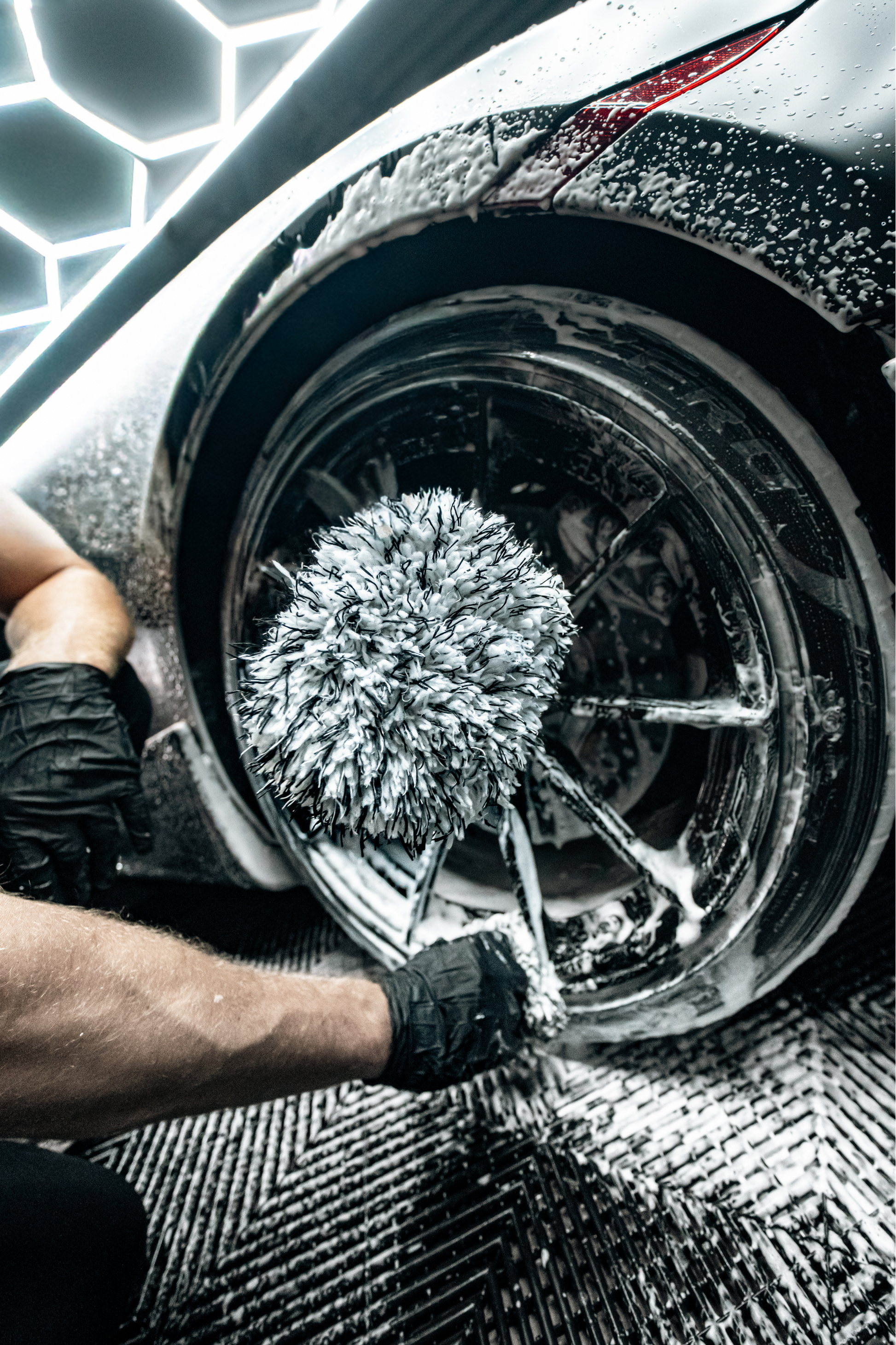 Blackline Car Care Microfiber Wheel Mitt with grey fibers used on a soapy wheel on Tampa Home & Garden Store