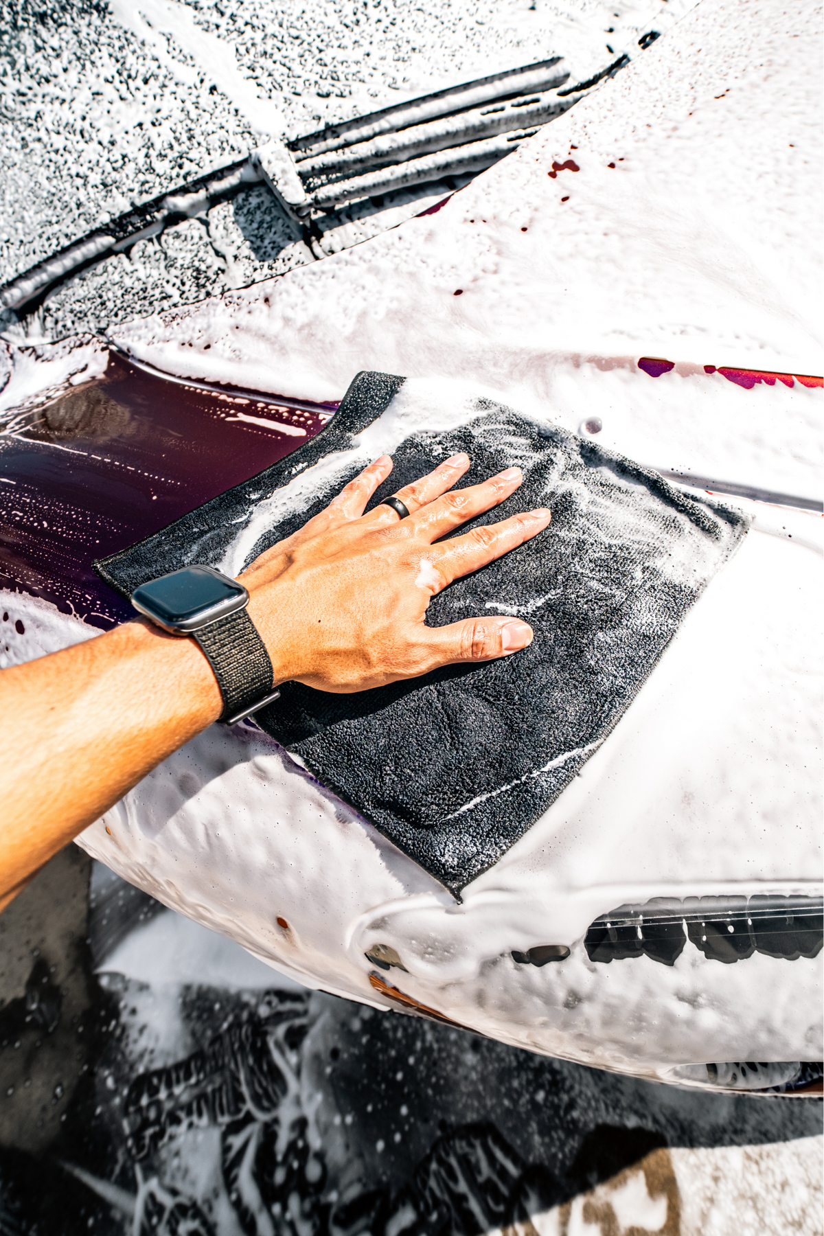 Blackline Synthetic Clay Towel gray microfiber detailing cloth for car wash on a foamy vehicle surface on Tampa Home & Garden Store