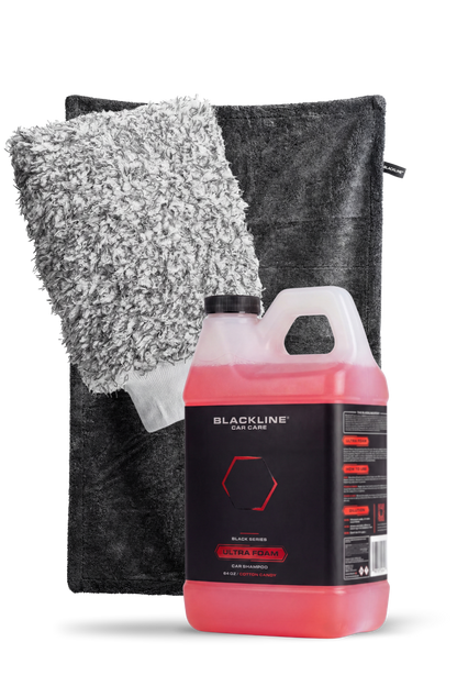 BLACKLINE Ultra Foam car shampoo bottle with pink liquid beside gray microfiber towel set on Tampa Home & Garden Store