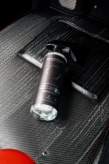 Blackline Reset interior cleaner spray bottle with black matte finish on car floor mat on Tampa Home & Garden Store
