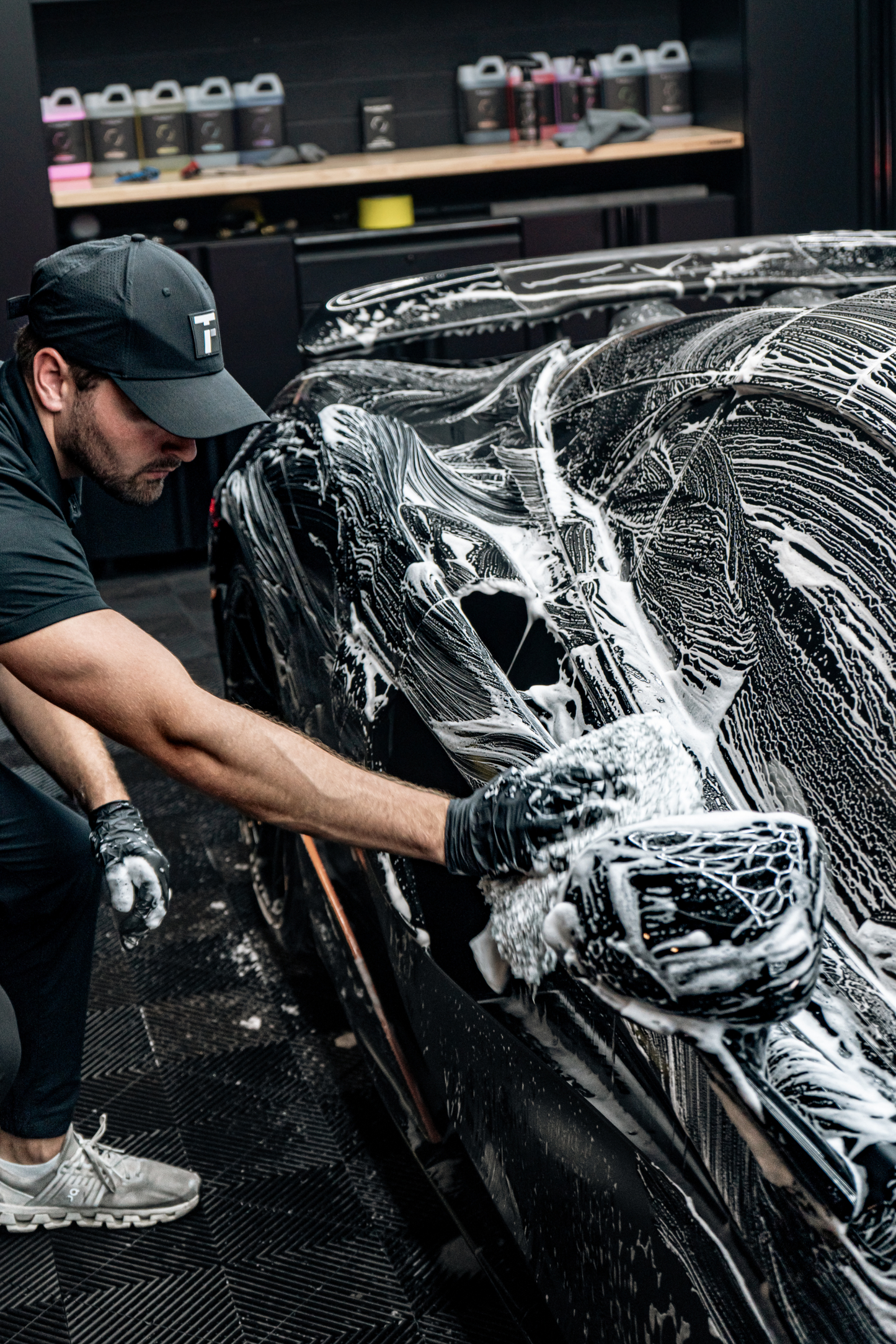 BLACKLINE® Microfiber Wash Mitt in black used to wash a foamy black car on Tampa Home & Garden Store