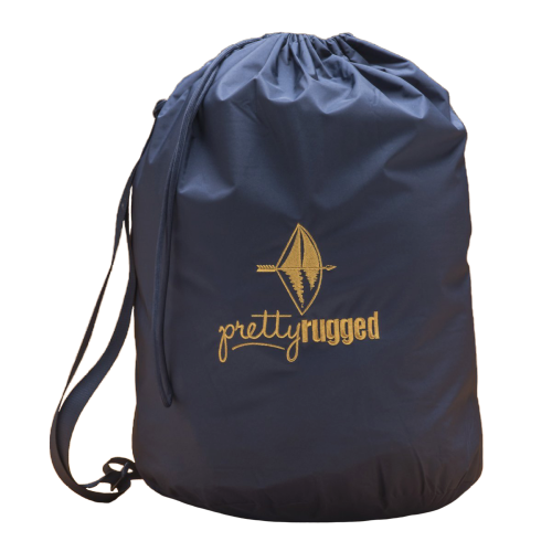 Villanova Large Blue Outdoor Blanket in navy drawstring bag with Pretty Rugged logo on Tampa Home & Garden Store