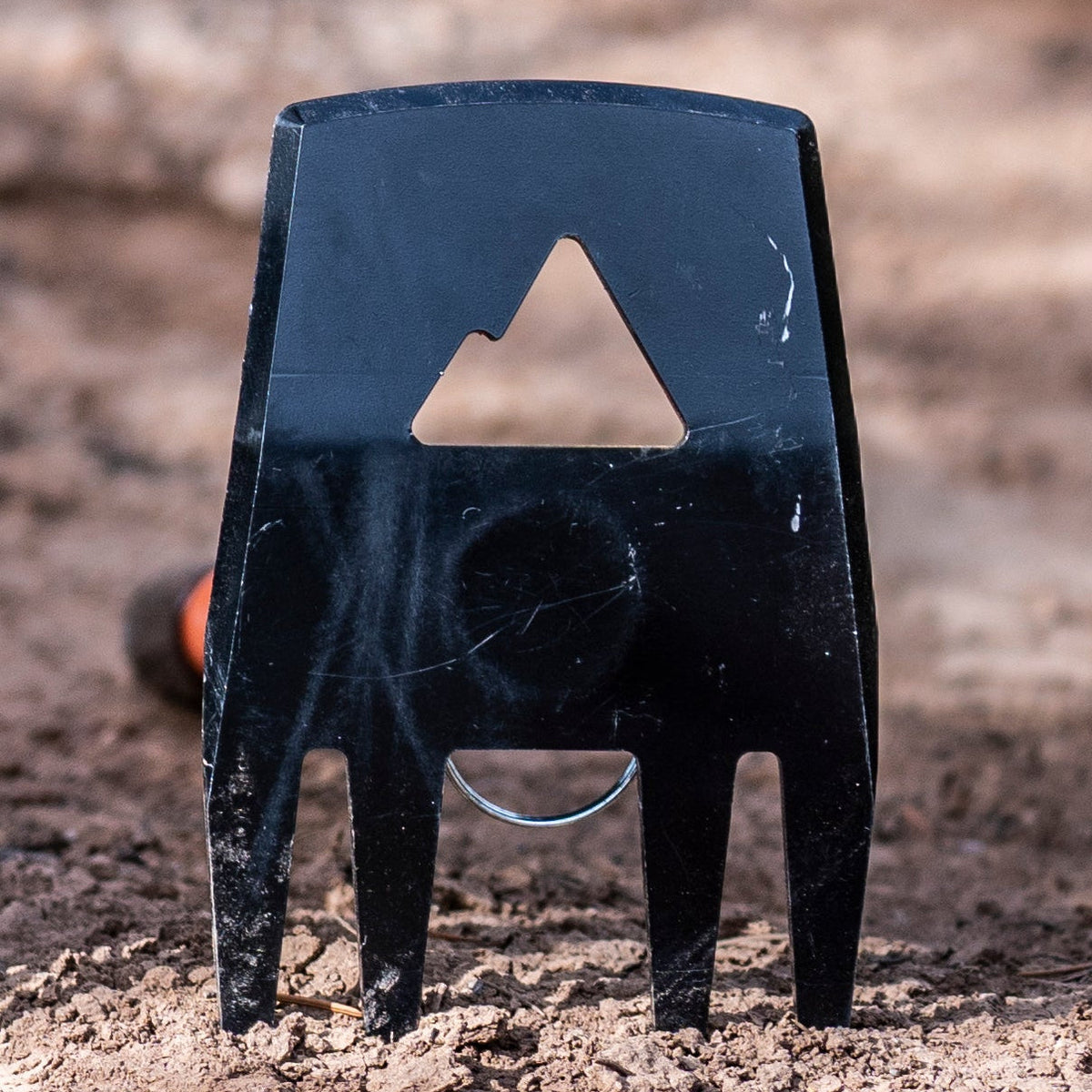 Blaze stand, black metal stake with triangular cutout and curved ring, by Backslope Tools on Tampa Home & Garden Store
