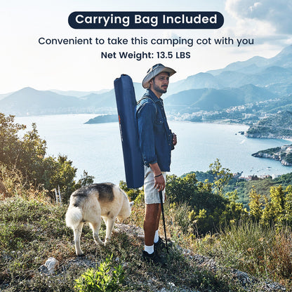 Adults Kids Folding Camping Cot GemGear with blue carrying bag on back at scenic coast on Tampa Home & Garden Store