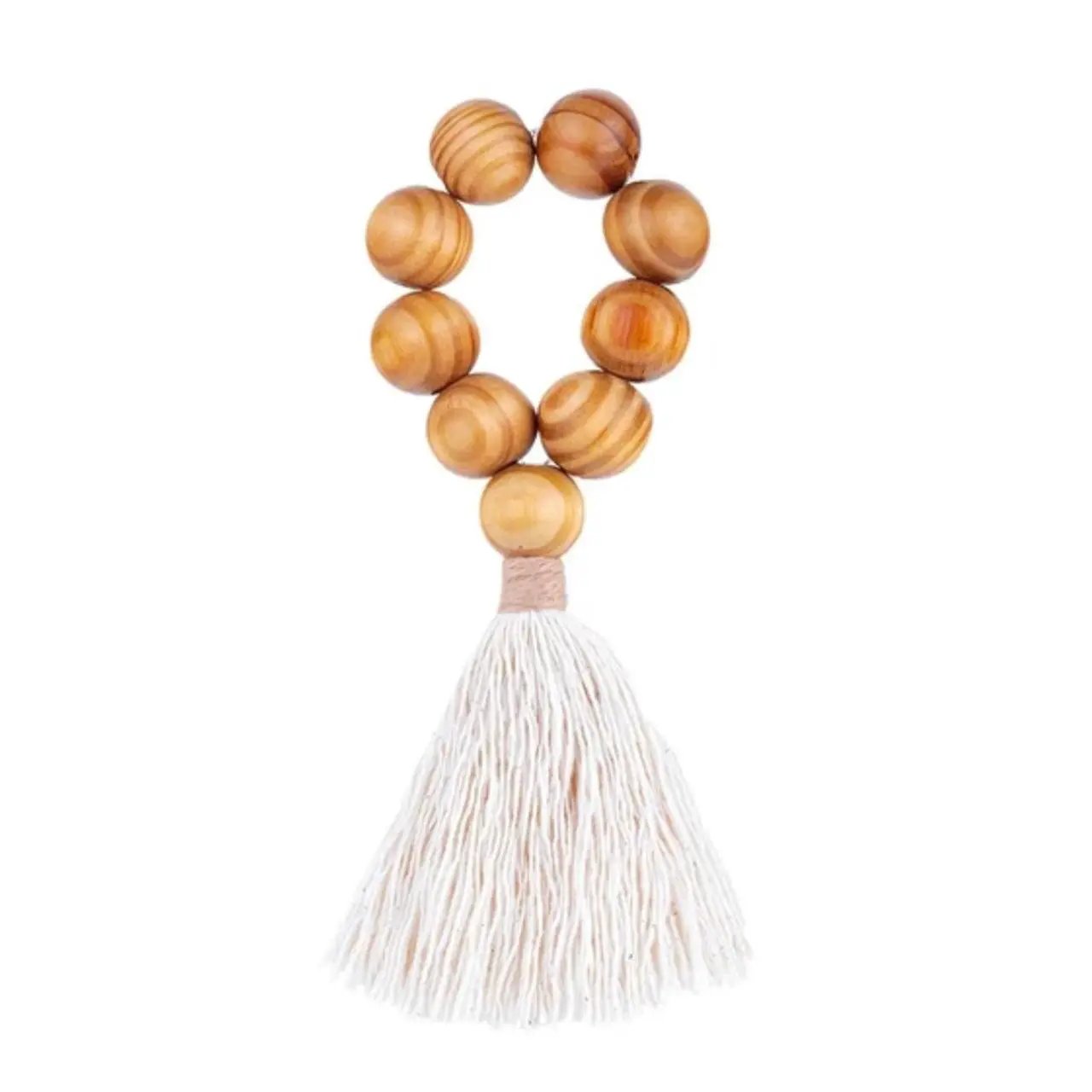 Boho napkin ring with wood bead loop and white tassel fringe by Talah Home on Tampa Home & Garden Store