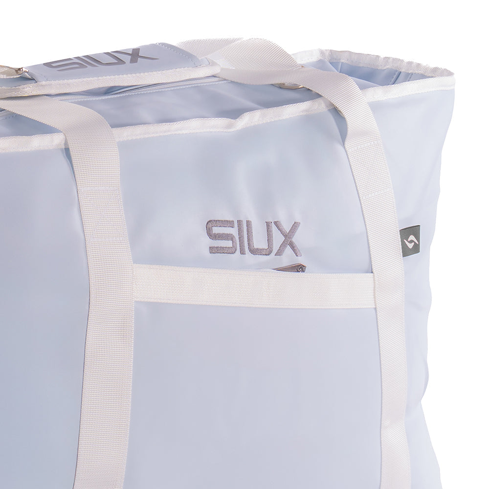 The Queen Bag by Siux USA; light blue duffel with white straps and front logo on Tampa Home & Garden Store