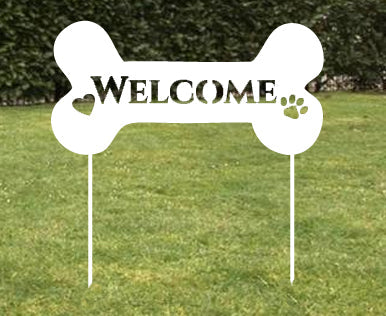 Dog Bone Welcome Sign lawn ornament, white bone shape with Welcome text and paw print on Tampa Home & Garden Store