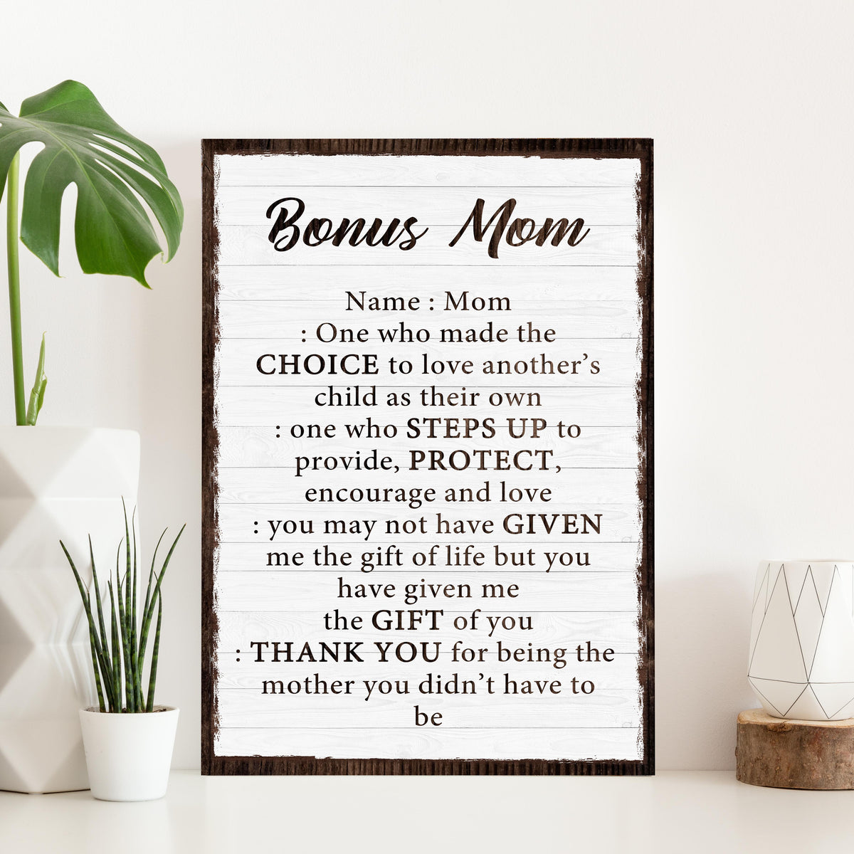 Bonus Mom canvas crafting sign with whitewashed wood panels and dark rustic frame on Tampa Home & Garden Store