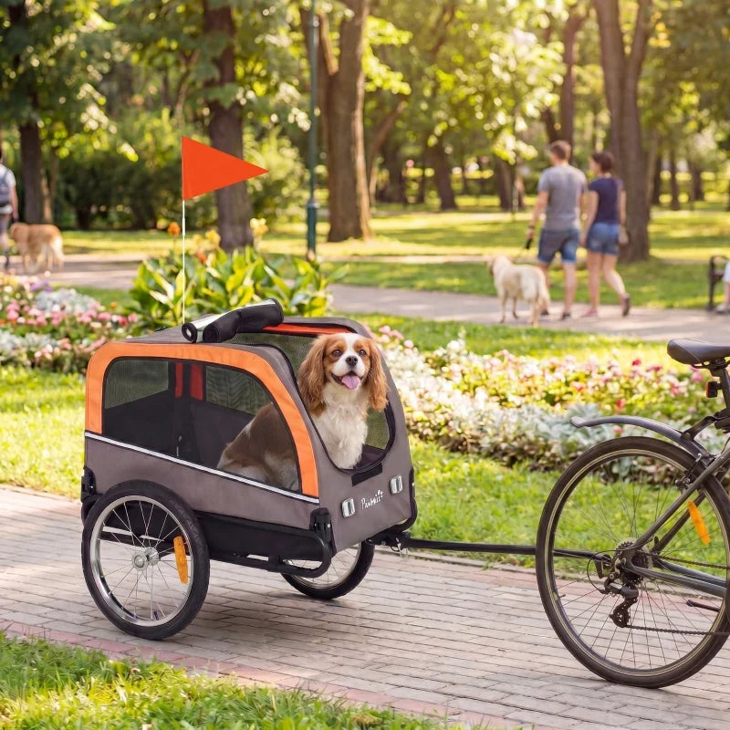 Dog bike trailer by Furr Baby Gifts, orange-gray pet cart with 20-inch air tires and flag on Tampa Home & Garden Store